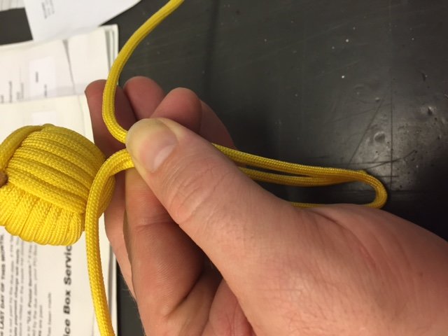 How to make another thing. Alright, let's get this how to started. First you will need: 10ft (3.048m) of paracord 1in (2.54cm) steel ball bearing Scissors (some